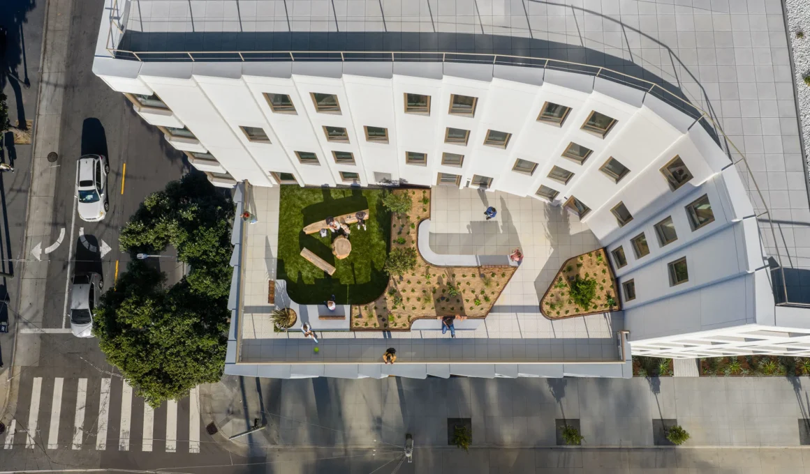 Aerial view of 730 Stanyan by OMA and Y.A. studio, showing the courtyard carved between the eight-story volume and lower wings | Photo Jason O'Rear