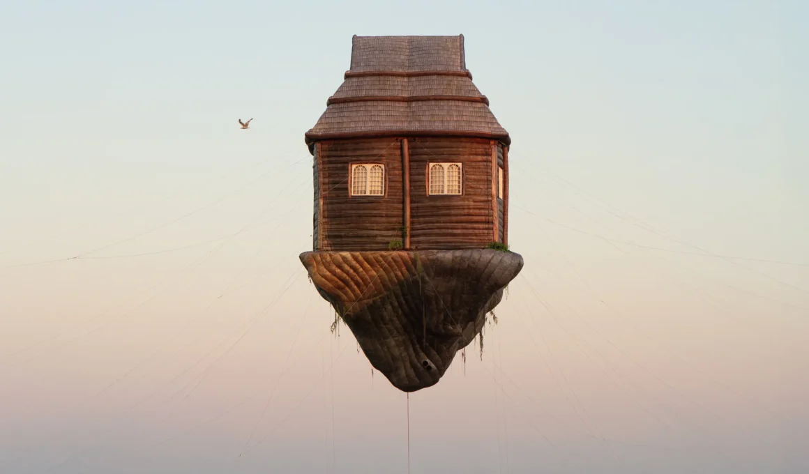 Nabatele floating synagogue by Anna Kamyshan, shingled timber roof and lit windows above a suspended rock base. Image: Polina Ahababova