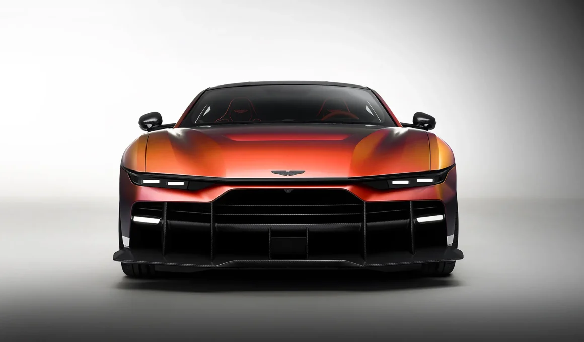Aston Martin Valen front view in satin Andromeda Red paint with carbon-fibre front splitter and full-width grille. Photography: Aston Martin