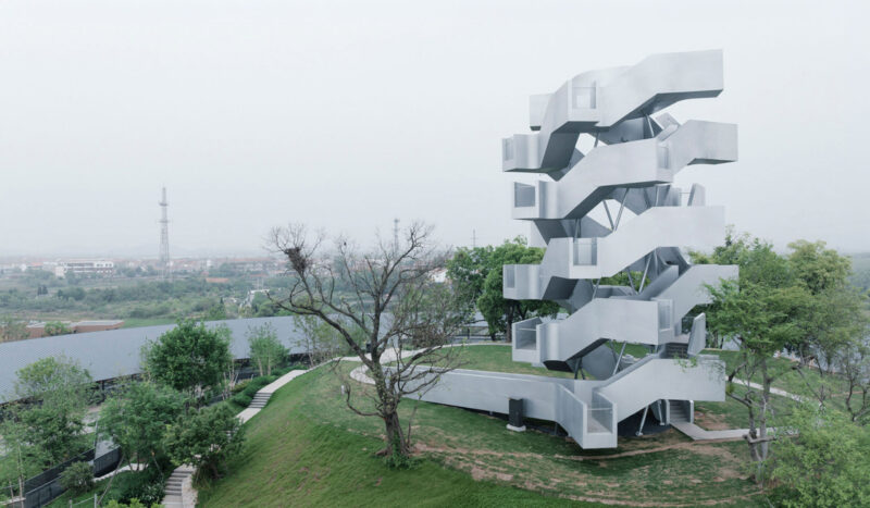 Chenhu Migratory Bird Observation Tower by Xiang Architects rising above Chenhu wetland grassland, photo by mumu