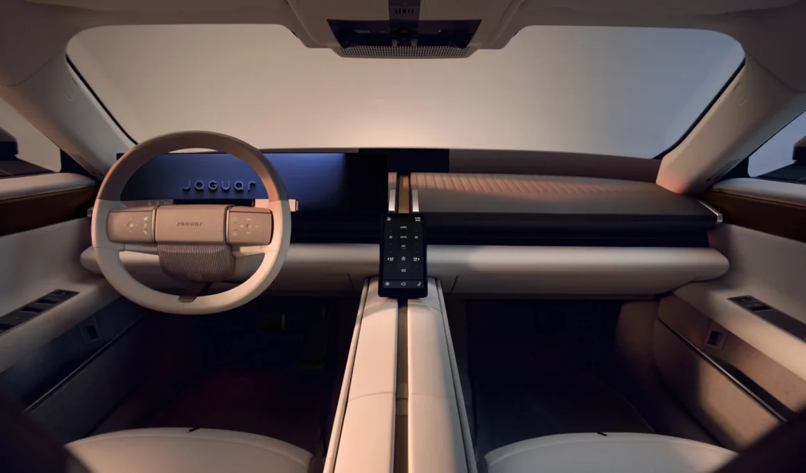 Jaguar Type 01 dashboard and steering wheel, showing the central spine's control panel and widescreen display