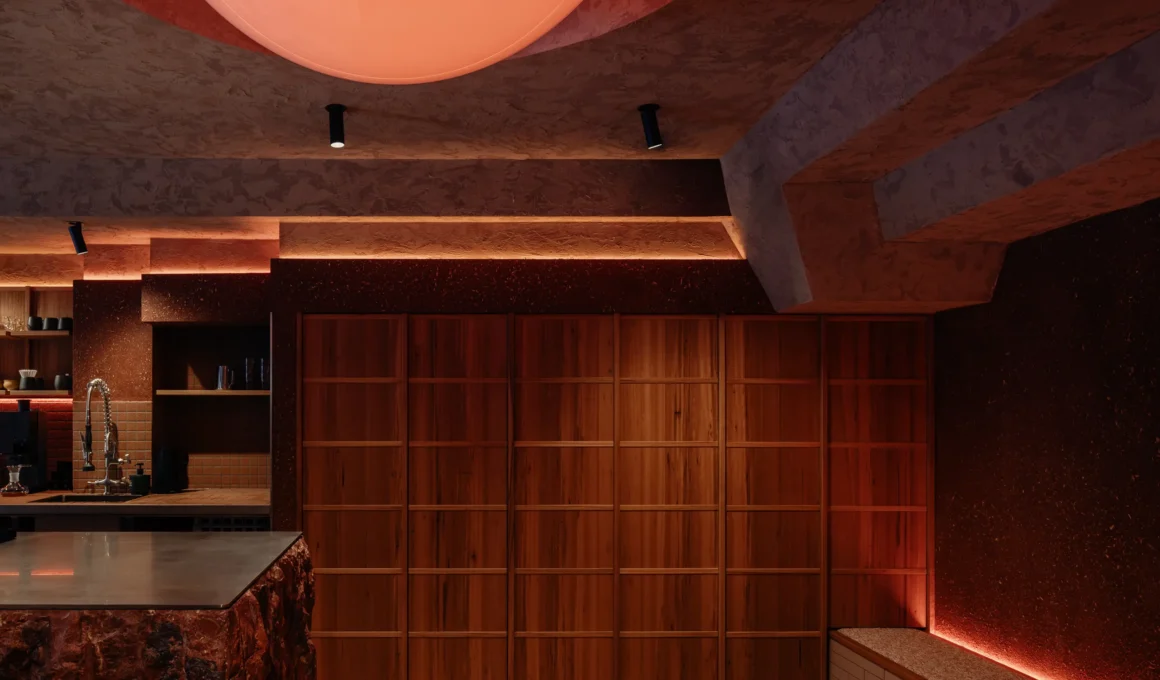 Mecca Coffee Foley Street by Killing Matt Woods — textured plaster ceiling, blackbutt timber joinery wall, Pilbara red marble counter