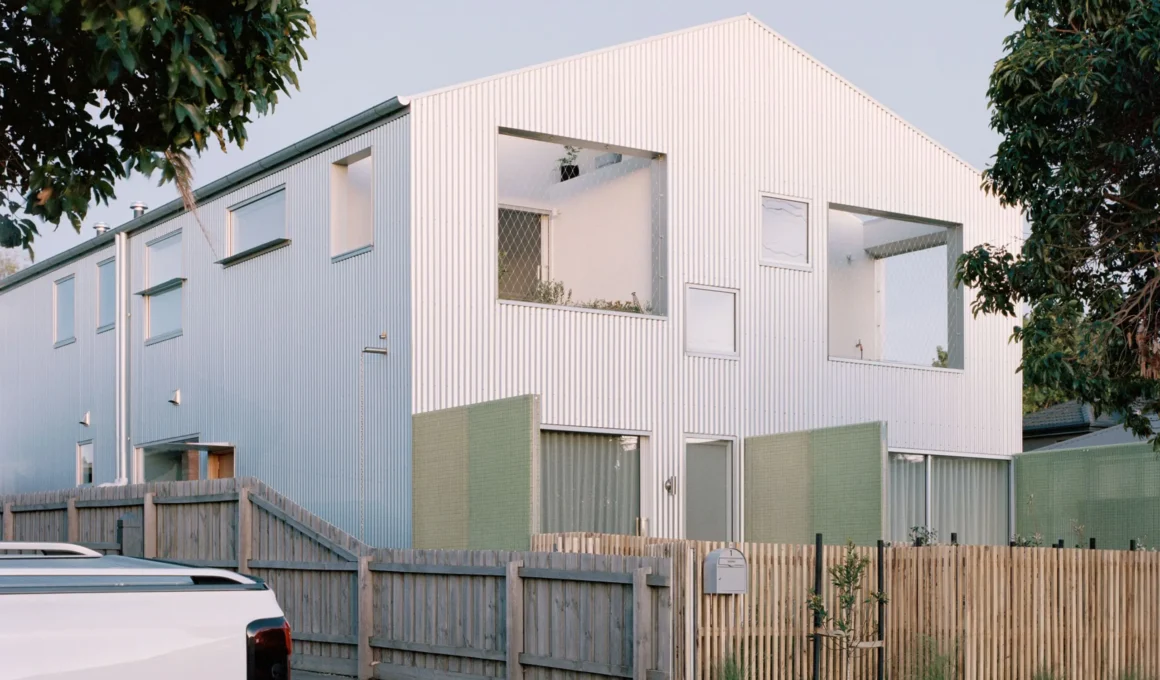 Shand Road townhouses by Ys Housing, Reservoir: Zincalume-clad exterior with semi-translucent FRP screens. Photo: Rory Gardiner
