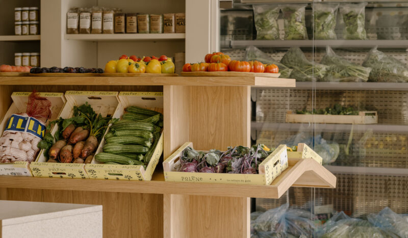 London Epicerie, Deidra Hodgson design: oak shelving and crates holding seasonal produce. Photo: James Retief