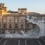 Diluvium by JR at the Vatican Apostolic Library, black-and-white wave installation spanning the facade on the Belvedere Courtyard