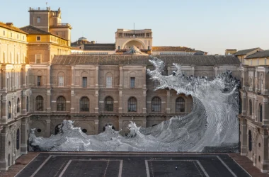 Diluvium by JR at the Vatican Apostolic Library, black-and-white wave installation spanning the facade on the Belvedere Courtyard