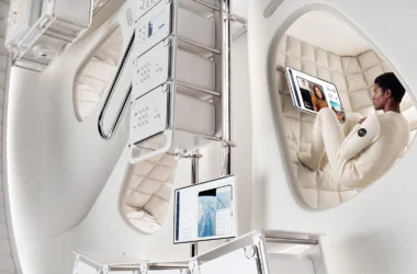 Thunderbird Space Station by OMI for Max Space, crew member in padded textile sleeping cocoon with screen, beside modular racks