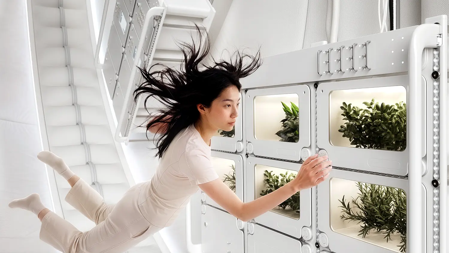 Thunderbird Space Station by OMI for Max Space, crew member floating at modular racks with illuminated plant compartments